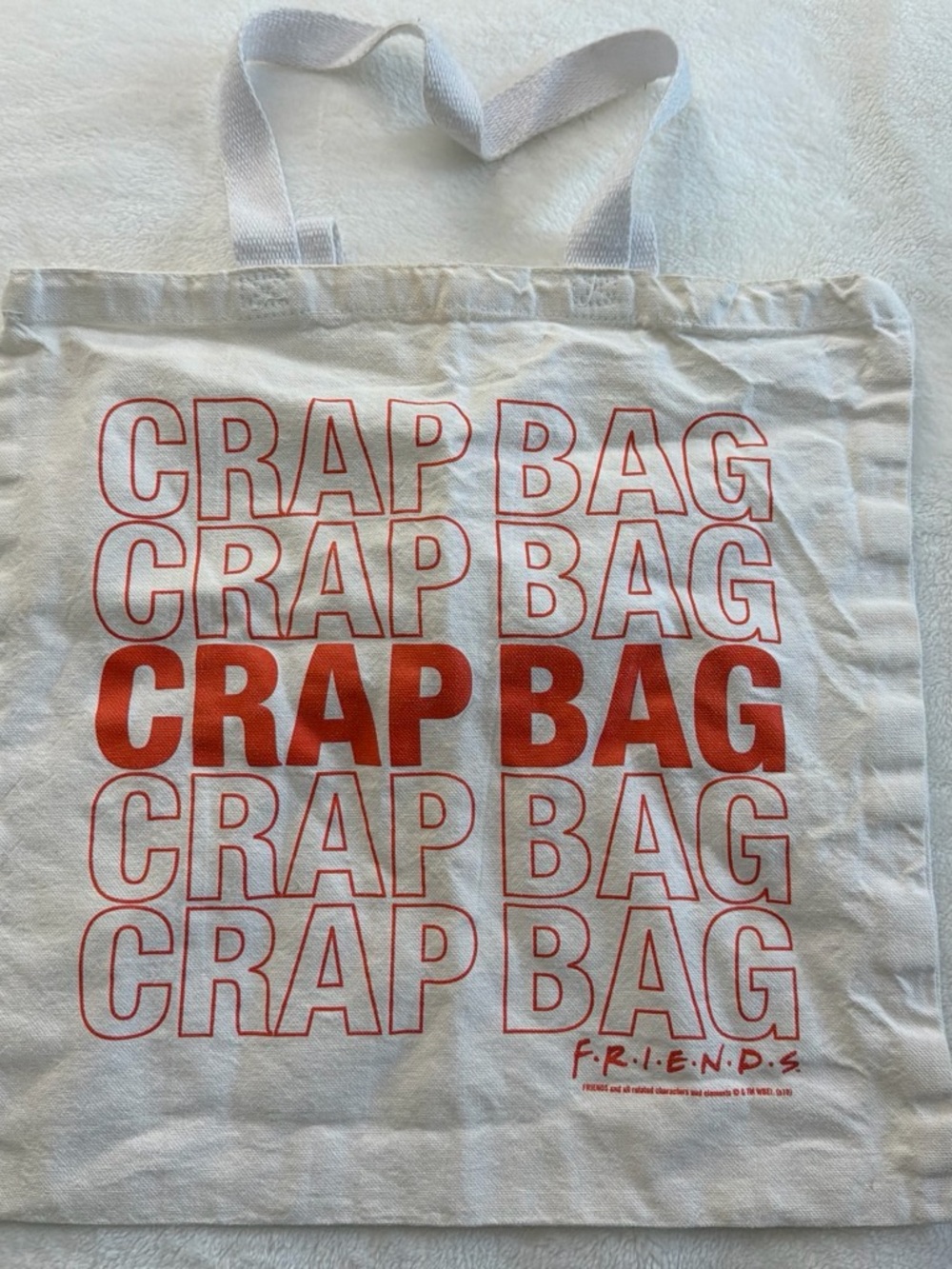 FRIENDS White Tote with Red Text "CRAP BAG"